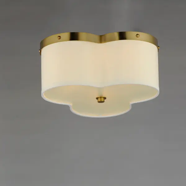 Honoring the traditional scalloped shade design in a range of materials, flush mounts are available in your choice of fabric, metal, or glass shades. The fabric shade features an Off-White linen fabric and is accented with Aged Brass metalwork. In the glass iteration, opal white glass features glossy elegant appeal with metal accents in Natural Aged Brass or Dark Bronze. The final iteration of metal shades has a white glass diffuser and metalwork finished in Polished Nickel or Natural Aged Brass. - alternate view