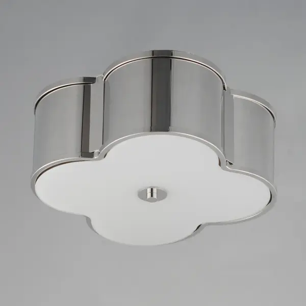 Honoring the traditional scalloped shade design in a range of materials, flush mounts are available in your choice of fabric, metal, or glass shades. The fabric shade features an Off-White linen fabric and is accented with Aged Brass metalwork. In the glass iteration, opal white glass features glossy elegant appeal with metal accents in Natural Aged Brass or Dark Bronze. The final iteration of metal shades has a white glass diffuser and metalwork finished in Polished Nickel or Natural Aged Brass. Collection: Clover Finish: Polished Nickel Glass: White Width: 14.00" Height: 6.25" Weight: 9.40 lb Wire: 8" Canopy: 7"x0.75" Number of Bulbs: 2 Maximum Wattage: 60.00 W Bulb Type: A19 Bulb Base: E26 Medium Light Source: Incandescent Dimmable Voltage: 120.00 V Material: Steel, Glass Safety Listing: cULus Safety Rating: Damp Manufacturer Warranty: 3 Spec Sheet Instructions - alternate view