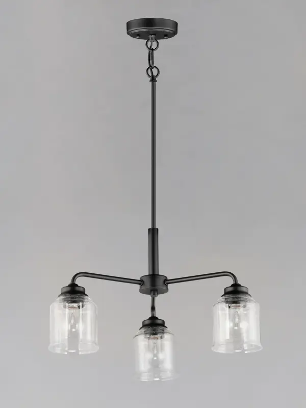 A modest frame of steel tubing gently bends to support a cluster of Clear Seedy bell-shaped glass. Similarly the bobeches and other metal accents echo that traditional bell shape creating an instant classic. An easy choice with transitional appeal, choose from a variety of complimentary finishes including matte Black, Heritage Brass or Satin Nickel. - alternate view