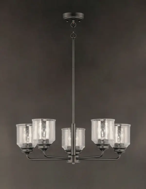 A modest frame of steel tubing gently bends to support a cluster of Clear Seedy bell-shaped glass. Similarly the bobeches and other metal accents echo that traditional bell shape creating an instant classic. An easy choice with transitional appeal, choose from a variety of complimentary finishes including matte Black, Heritage Brass or Satin Nickel. - alternate view