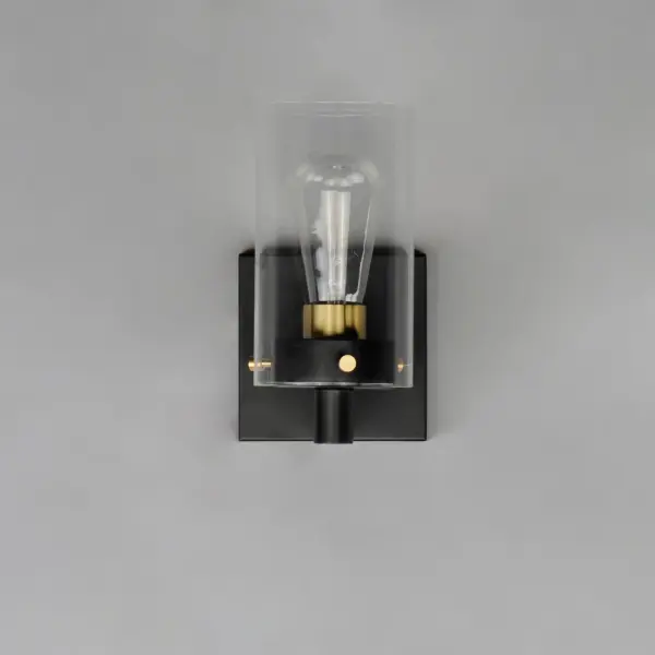 Simple clear glass cylinders are secured by decorative thumb screws in this transitional collection of sconces and pendants both neutral in design and suitable for damp applications. Choose from Satin Nickel or a two-tone Black and Satin Brass finish to pair with popular interior finishes in hardware, plumbing and decor. - alternate view