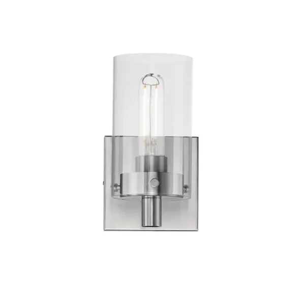Simple clear glass cylinders are secured by decorative thumb screws in this transitional collection of sconces and pendants both neutral in design and suitable for damp applications. Choose from Satin Nickel or a two-tone Black and Satin Brass finish to pair with popular interior finishes in hardware, plumbing and decor.