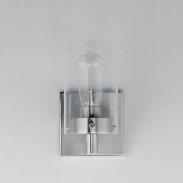 Simple clear glass cylinders are secured by decorative thumb screws in this transitional collection of sconces and pendants both neutral in design and suitable for damp applications. Choose from Satin Nickel or a two-tone Black and Satin Brass finish to pair with popular interior finishes in hardware, plumbing and decor. - alternate view