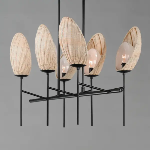 A classical chandelier that transports you to a tropical paradise, the Maldives collection features hand woven wicker shades that elegantly curve around precisely cut opal white glass. Suspended on slender supports of steel finished in Matte Black, the handcrafted shade structures conjure up images of bungalows along the coast. Available in chandelier and sconce configurations. - alternate view