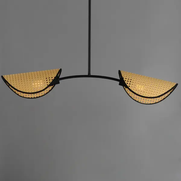 Natural cane woven wicker shades curve over exposed light bulbs like the brim of a bonnet on a minimalistic mobile chandelier. The composition of shade and chandelier shape are of a corresponding curvature. The contrast of natural materials and sandy Black silhouette of chandelier form adds nostalgia to an overall modern design. The shades are rotatable under another axis of articulation allowing more flexibility in the design according to your preference. - alternate view