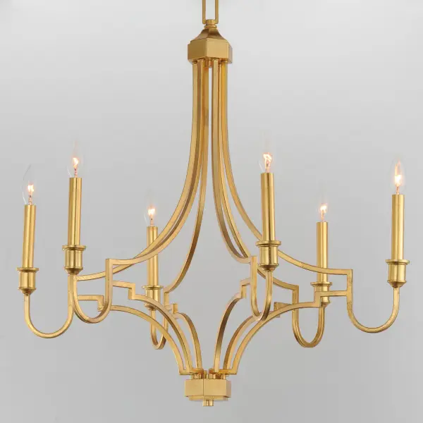 Gallant in hand-applied Gold Leaf, the Normandy collection is a look befitting a chateau of the Middle Ages.  Both traditional and handsome, the exposed candelabras are gilt in matching Gold Leaf sleeves as they perch at the end of decorative bobeches. The sharply-angled curves of the arms anchor to polygonal elements adding a tailored elegance to the chandelier's design. Thoughtful in its composition, the collection provides an authentic interpretation to a classical concept. - alternate view