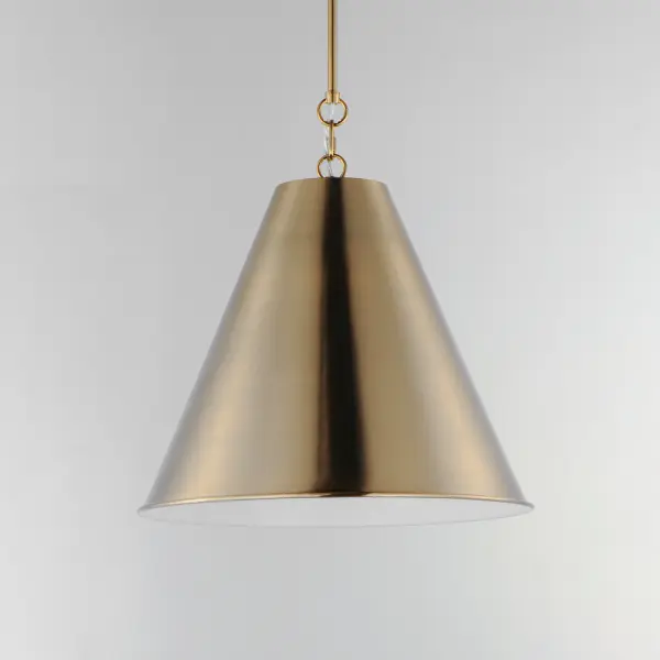 The iconic metal spun cone shade offers a transitional pendant design great as multiples over a kitchen island or dining table. Available in rich finishes including Heritage Brass, Satin Nickel, and Chestnut Bronze. All these shades are painted white on the interior for added luminosity and even light color. Collection: Veritas Finish: Heritage Width: 18.00" Height: 19.50" Length: 18.00" Weight: 3.20 lb Wire: 120" Canopy: 5.5"x5.5"x0.75" Number of Bulbs: 1 Maximum Wattage: 60.00 W Bulb Type: A19 Bulb Base: E26 Medium Light Source: Incandescent Dimmable Voltage: 120.00 V Material: Steel Safety Listing: cETLus Safety Rating: Dry Spec Sheet Instructions - alternate view