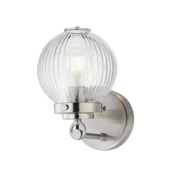 Nostalgic spherical glass volumes with a ribbed pattern and a dipped flat bottom, this collection offers a retro and eclectic choice for pendants and sconces. Available in Oil Rubbed Bronze, Satin Brass, and Satin Nickel, these fixtures provide elegant illumination, adding distinctive style to common spaces. Collection: Kasbah Finish: Satin Nickel Glass: Clear Ribbed Width: 6.00" Height: 9.00" Weight: 1.98 lb Extension from Wall: 7.75" Wire: 8" Canopy: 4.75"x4.75" Number of Bulbs: 1 Maximum Wattage: 60.00 W Bulb Type: A19 Bulb Base: E26 Medium Light Source: Incandescent Dimmable Voltage: 120.00 V Material: Steel, Glass Safety Listing: cETLus Safety Rating: Damp Spec Sheet Instructions