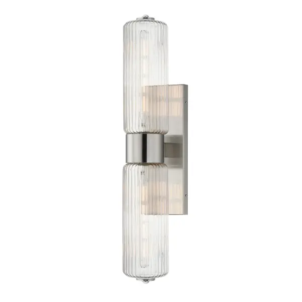 Nostalgic spherical glass volumes with a ribbed pattern and a dipped flat bottom, this collection offers a retro and eclectic choice for pendants and sconces. Available in Oil Rubbed Bronze, Satin Brass, and Satin Nickel, these fixtures provide elegant illumination, adding distinctive style to common spaces. Collection: Kasbah Finish: Satin Nickel Glass: Clear Ribbed Width: 5.00" Height: 28.25" Weight: 6.06 lb Extension from Wall: 6.75" Wire: 8" Canopy: 13.75"x5" Number of Bulbs: 2 Maximum Wattage: 60.00 W Bulb Type: T10 Bulb Base: E26 Medium Light Source: Incandescent Dimmable Voltage: 120.00 V Material: Steel, Glass Safety Listing: cETLus Safety Rating: Damp Spec Sheet Instructions