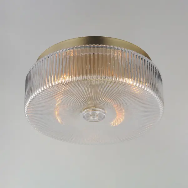 Nostalgic spherical glass volumes with a ribbed pattern and a dipped flat bottom, this collection offers a retro and eclectic choice for pendants and sconces. Available in Oil Rubbed Bronze, Satin Brass, and Satin Nickel, these fixtures provide elegant illumination, adding distinctive style to common spaces. Collection: Kasbah Finish: Satin Brass Glass: Clear Ribbed Width: 15.75" Height: 7.25" Length: 15.75" Weight: 11.91 lb Wire: 8" Canopy: 13.5"x13.5"x1.5" Number of Bulbs: 4 Maximum Wattage: 60.00 W Bulb Type: A19 Bulb Base: E26 Medium Light Source: Incandescent Dimmable Voltage: 120.00 V Material: Steel, Glass Safety Listing: cETLus Safety Rating: Dry Spec Sheet Instructions - alternate view