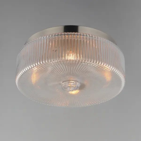 Nostalgic spherical glass volumes with a ribbed pattern and a dipped flat bottom, this collection offers a retro and eclectic choice for pendants and sconces. Available in Oil Rubbed Bronze, Satin Brass, and Satin Nickel, these fixtures provide elegant illumination, adding distinctive style to common spaces. Collection: Kasbah Finish: Satin Nickel Glass: Clear Ribbed Width: 15.75" Height: 7.25" Length: 15.75" Weight: 11.91 lb Wire: 8" Canopy: 13.5"x13.5"x1.5" Number of Bulbs: 4 Maximum Wattage: 60.00 W Bulb Type: A19 Bulb Base: E26 Medium Light Source: Incandescent Dimmable Voltage: 120.00 V Material: Steel, Glass Safety Listing: cETLus Safety Rating: Dry Spec Sheet Instructions - alternate view