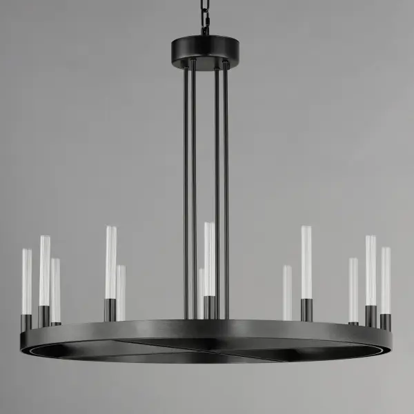A modern tribute to the wheel chandelier, the Ovation collection integrates LED technology for a dazzling lighting effect. The LED light produces a shimmering lighting effect along the tall and narrow fluted glass shades adding celebratory effervescence. The expansive diameters of the rings join at the center in equipoise using four down rods to suspend the frame. Mount the chandelier from the collector or make use of additional chain supplied to extend the height with ease. Additional sconces with up and down lighting complete the design. Available in Brushed Brass or Black, the collection toasts a classic design creating an elegant statement. - alternate view