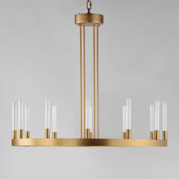 A modern tribute to the wheel chandelier, the Ovation collection integrates LED technology for a dazzling lighting effect. The LED light produces a shimmering lighting effect along the tall and narrow fluted glass shades adding celebratory effervescence. The expansive diameters of the rings join at the center in equipoise using four down rods to suspend the frame. Mount the chandelier from the collector or make use of additional chain supplied to extend the height with ease. Additional sconces with up and down lighting complete the design. Available in Brushed Brass or Black, the collection toasts a classic design creating an elegant statement. Collection: Ovation Finish: Gold Glass: Clear Ribbed Width: 31.50" Height: 24.35" Length: 31.50" Weight: 16.28 lb Chain: 36" Wire: 120" Canopy: 5.75"x5.75"x1.5" Bulbs Included Number of Bulbs: 12 Maximum Wattage: 2.00 W Bulb Type: PCB Bulb Base: PCB Integrated Light Source: LED Light Output: 1750.00 lm Color Temperature: 3000 K CRI: 90 Dimmable Rated Average Life: 50000 Voltage: 120.00 V Material: Aluminum, Steel, Glass Safety Listing: cETLus Safety Rating: Dry LED Spec Sheet Instructions - alternate view