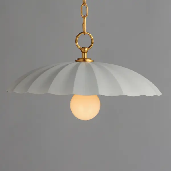 This refreshing collection features the nostalgic detailing of scalloped metal shades with gold leaf interiors. The hand applied gold-leaf interiors reflect the light source within the shades casting a warmer glow downwards. The collection is offered in charming chain hung pendants, a flush mount with Opal White schoolhouse glass, or oversized sconces. Available in Matte Black, Matte White, or Dark Grey with Gold leaf interiors and metalwork. Collection: Primrose Finish: Matte White / Gold Leaf Width: 16.00" Height: 9.00" Length: 16.00" Weight: 3.40 lb Chain: 36" Wire: 120" Canopy: 5.25"x5.25"x1.25" Number of Bulbs: 1 Maximum Wattage: 60.00 W Bulb Type: E26 Bulb Base: E26 Medium Light Source: Incandescent Dimmable Voltage: 120.00 V Material: Steel Safety Listing: cETLus Safety Rating: Dry Spec Sheet Instructions - alternate view