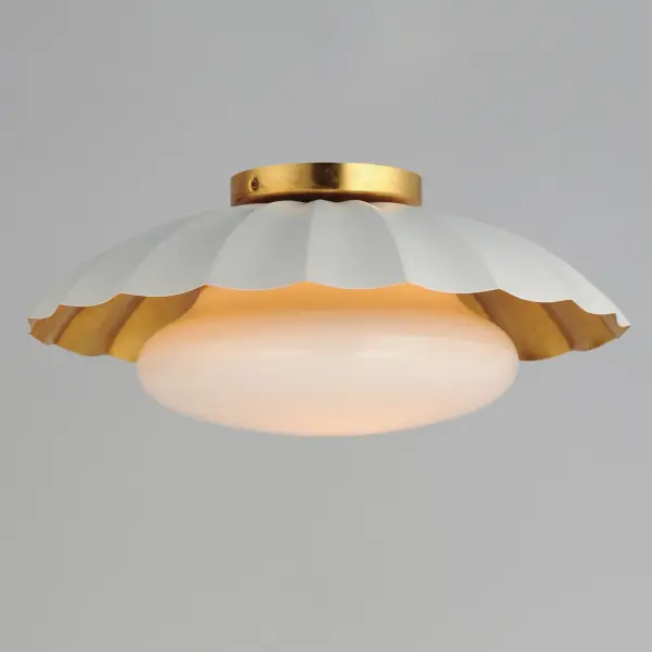 This refreshing collection features the nostalgic detailing of scalloped metal shades with gold leaf interiors. The hand applied gold-leaf interiors reflect the light source within the shades casting a warmer glow downwards. The collection is offered in charming chain hung pendants, a flush mount with Opal White schoolhouse glass, or oversized sconces. Available in Matte Black, Matte White, or Dark Grey with Gold leaf interiors and metalwork. Collection: Primrose Finish: Matte White / Gold Leaf Width: 16.00" Height: 6.75" Length: 16.00" Weight: 4.90 lb Wire: 8" Canopy: 5"x5"x0.75" Number of Bulbs: 1 Maximum Wattage: 60.00 W Bulb Type: E26 Bulb Base: E26 Medium Light Source: Incandescent Dimmable Voltage: 120.00 V Material: Steel, Glass Safety Listing: cETLus Safety Rating: Damp Spec Sheet Instructions - alternate view