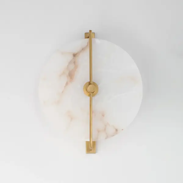 Modern in execution, the Quarry collection features natural Spanish alabaster in an iron frame finished in Darkened Bronze or Natural Aged Brass. Dedicated LED housing shine light on alabaster panels, highlighting the stone's beautiful, veined characteristics while also providing ambient lighting. These surface mounted fixtures are designed to install on either wall or ceiling surfaces. Collection: Quarry Finish: Natural Aged Brass Glass: White Alabaster Width: 12.25" Height: 4.00" Length: 11.75" Weight: 2.20 lb Wire: 8" Canopy: 5"x5"x1" Bulbs Included Number of Bulbs: 1 Maximum Wattage: 13.00 W Bulb Type: LED Bulb Base: PCB Integrated Light Source: LED Light Output: 825.00 lm Color Temperature: 3000 K CRI: 90 Dimmable Rated Average Life: 50000 Voltage: 120.00 V Material: Steel, Aluminum, Spanish Alabaster Safety Rating: Damp ADA LED Spec Sheet Instructions - alternate view