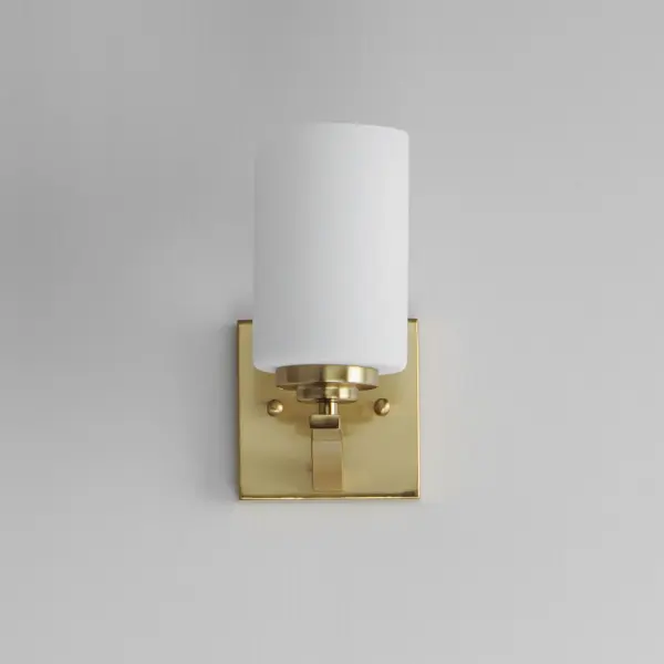 Low sloping arms of rectilinear tubing is finished in a variety of options that include Satin Nickel, Oil Rubbed Bronze, Matte Black, and a contemporary Satin Brass finish. Tall, cylindrical Satin White glass shades soften the light source within. Offered in a variety of configurations that include chandeliers, sconces, and a semi-flush pendant that may be used as a foyer pendant, has become a proven popular choice among builders. Collection: Deven Finish: Satin Brass Glass: Satin White Width: 4.75" Height: 9.00" Weight: 1.34 lb Extension from Wall: 6.25" Wire: 8" Canopy: 4.75"x4.75" Number of Bulbs: 1 Maximum Wattage: 60.00 W Bulb Type: A19 Bulb Base: E26 Medium Light Source: Incandescent Dimmable Voltage: 120.00 V Material: Steel, Glass Safety Listing: cETLus Safety Rating: Damp Spec Sheet Instructions - alternate view