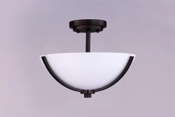 Low sloping arms of rectilinear tubing is finished in a variety of options that include Satin Nickel, Oil Rubbed Bronze, Matte Black, and a contemporary Satin Brass finish. Tall, cylindrical Satin White glass shades soften the light source within. Offered in a variety of configurations that include chandeliers, sconces, and a semi-flush pendant that may be used as a foyer pendant, has become a proven popular choice among builders. Collection: Deven Finish: Oil Rubbed Bronze Glass: Satin White Width: 14.00" Height: 10.00" Length: 14.00" Weight: 3.63 lb Canopy: 1``x5`` Number of Bulbs: 3 Maximum Wattage: 60.00 W Bulb Type: A19 Bulb Base: E26 Medium Light Source: Incandescent Dimmable Voltage: 120.00 V Material: Steel, Glass Safety Listing: cETLus Safety Rating: Dry Manufacturer Warranty: 1 Spec Sheet Instructions Parts Diagram - alternate view