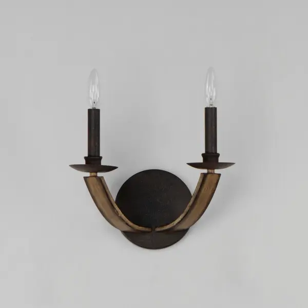 The timeless Empire chandelier shape styled in timeworn, natural finishes uses durable steel in a Driftwood finish that includes a spherical ornament in matching finish. The arms curve steeply, swept lower than the chandelier's center, emphasizing the chandelier's height while mitered angles at its top accentuate the thickness of the barrel-like planks. Exposed candelabra lamps on Anthracite candle covers adding texture and contrast. The result of the organic wood tones reduces the formality of the classical shape making the elegance of this design more inviting. - alternate view