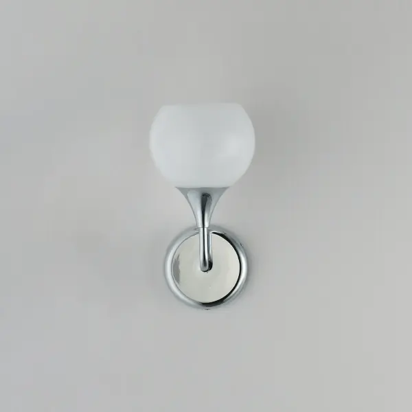 Featuring a swirling white Marble Glass globe that encases the light source, the shades are reminiscent of snowglobes. The collection provides a wonderfully wintery composition that is timelessly elegant effortlessly sophisticated. Choose from multiple sizes of the bath vanity lights as well as pendant configurations or two flush mount options. Available in Natural Aged Brass, Polished Chrome, or Matte Black. Collection: Neve Finish: Polished Chrome Glass: Marble Width: 6.00" Height: 11.75" Weight: 1.50 lb Extension from Wall: 6.25" Wire: 8" Canopy: 4.75"x4.75" Number of Bulbs: 1 Maximum Wattage: 60.00 W Bulb Base: E26 Medium Light Source: Incandescent Voltage: 120.00 V Material: Steel Safety Listing: cETLus Safety Rating: Damp Spec Sheet Instructions - alternate view
