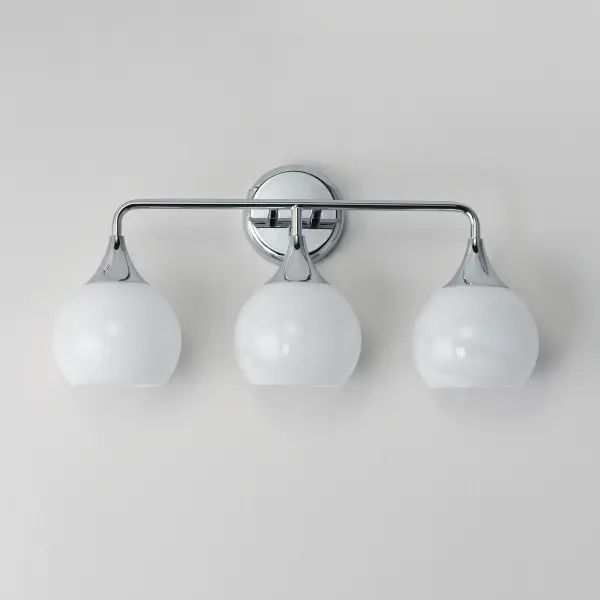 Featuring a swirling white Marble Glass globe that encases the light source, the shades are reminiscent of snowglobes. The collection provides a wonderfully wintery composition that is timelessly elegant effortlessly sophisticated. Choose from multiple sizes of the bath vanity lights as well as pendant configurations or two flush mount options. Available in Natural Aged Brass, Polished Chrome, or Matte Black. Collection: Neve Finish: Polished Chrome Glass: Marble Width: 22.50" Height: 10.75" Weight: 3.96 lb Extension from Wall: 6.50" Wire: 8" Canopy: 4.75"x4.75" Number of Bulbs: 3 Maximum Wattage: 60.00 W Bulb Base: E26 Medium Light Source: Incandescent Voltage: 120.00 V Material: Steel Safety Listing: cETLus Safety Rating: Damp Spec Sheet Instructions - alternate view