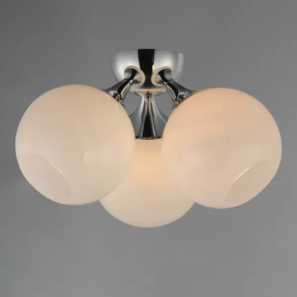 Featuring a swirling white Marble Glass globe that encases the light source, the shades are reminiscent of snowglobes. The collection provides a wonderfully wintery composition that is timelessly elegant effortlessly sophisticated. Choose from multiple sizes of the bath vanity lights as well as pendant configurations or two flush mount options. Available in Natural Aged Brass, Polished Chrome, or Matte Black. Collection: Neve Finish: Polished Chrome Glass: Marble Width: 18.75" Height: 10.50" Length: 18.75" Weight: 6.33 lb Wire: 10" Canopy: 5"x5"x2.5" Number of Bulbs: 3 Maximum Wattage: 60.00 W Bulb Type: E26 Bulb Base: E26 Medium Light Source: Incandescent Voltage: 120.00 V Material: Steel, glass Safety Listing: cETLus Safety Rating: Dry Manufacturer Warranty: 2 Spec Sheet Instructions - alternate view