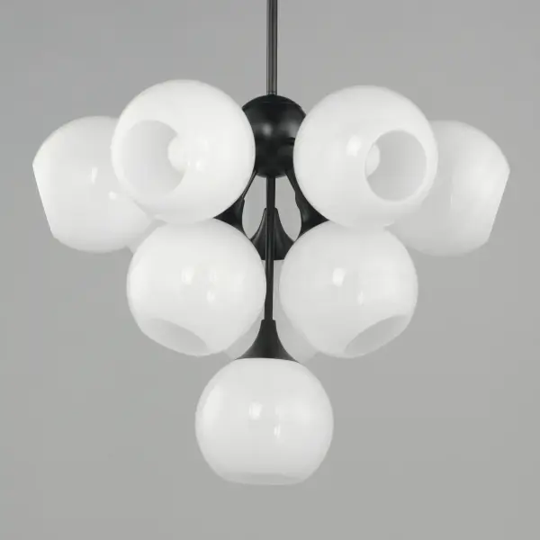 Featuring a swirling white Marble Glass globe that encases the light source, the shades are reminiscent of snowglobes. The collection provides a wonderfully wintery composition that is timelessly elegant effortlessly sophisticated. Choose from multiple sizes of the bath vanity lights as well as pendant configurations or two flush mount options. Available in Natural Aged Brass, Polished Chrome, or Matte Black. - alternate view