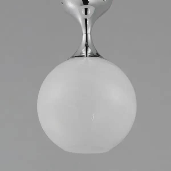 Featuring a swirling white Marble Glass globe that encases the light source, the shades are reminiscent of snowglobes. The collection provides a wonderfully wintery composition that is timelessly elegant effortlessly sophisticated. Choose from multiple sizes of the bath vanity lights as well as pendant configurations or two flush mount options. Available in Natural Aged Brass, Polished Chrome, or Matte Black. Collection: Neve Finish: Polished Chrome Glass: Marble Width: 9.00" Height: 14.00" Length: 9.00" Weight: 2.64 lb Wire: 10" Canopy: 4.75"x4.75"x3.25" Number of Bulbs: 1 Maximum Wattage: 60.00 W Bulb Base: E26 Medium Light Source: Incandescent Voltage: 120.00 V Material: Steel Safety Listing: cETLus Safety Rating: Dry Spec Sheet Instructions - alternate view