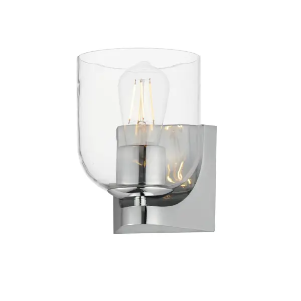 Cut-out metalwork curves around modern bell-shaped glass shades. The series includes pendants and bath vanities available in either Clear or a swirling Marble glass. Available in various complementary finishes: Polished Chrome, Matte Black, or Natural Aged Brass these fixtures make a delightful addition to bathroom spaces, bedrooms, or over a kitchen island. Collection: Scoop Finish: Polished Chrome Glass: Clear Width: 5.50" Height: 7.25" Weight: 1.98 lb Extension from Wall: 6.25" Wire: 6" Canopy: 4.75"x4.75" Number of Bulbs: 1 Maximum Wattage: 60.00 W Bulb Type: E26 Bulb Base: E26 Medium Light Source: Incandescent Dimmable Voltage: 120.00 V Material: Steel, Glass Safety Listing: cULus Safety Rating: Damp Spec Sheet Instructions