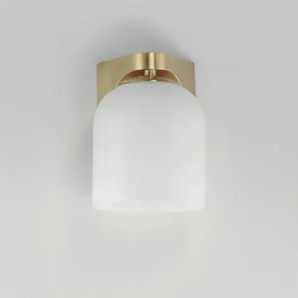Cut-out metalwork curves around modern bell-shaped glass shades. The series includes pendants and bath vanities available in either Clear or a swirling Marble glass. Available in various complementary finishes: Polished Chrome, Matte Black, or Natural Aged Brass these fixtures make a delightful addition to bathroom spaces, bedrooms, or over a kitchen island. Collection: Scoop Finish: Natural Aged Brass Glass: Marble Width: 5.50" Height: 7.25" Weight: 1.98 lb Extension from Wall: 6.25" Wire: 6" Canopy: 4.75"x4.75" Number of Bulbs: 1 Maximum Wattage: 60.00 W Bulb Type: E26 Bulb Base: E26 Medium Light Source: Incandescent Dimmable Voltage: 120.00 V Material: Steel, Glass Safety Listing: cULus Safety Rating: Damp Spec Sheet Instructions - alternate view