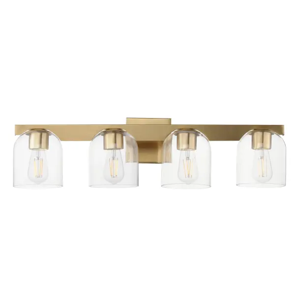 Cut-out metalwork curves around modern bell-shaped glass shades. The series includes pendants and bath vanities available in either Clear or a swirling Marble glass. Available in various complementary finishes: Polished Chrome, Matte Black, or Natural Aged Brass these fixtures make a delightful addition to bathroom spaces, bedrooms, or over a kitchen island. Collection: Scoop Finish: Natural Aged Brass Glass: Clear Width: 29.50" Height: 8.00" Weight: 8.80 lb Extension from Wall: 7.00" Wire: 6" Canopy: 5"x5" Number of Bulbs: 4 Maximum Wattage: 6.00 W Bulb Type: E26 Bulb Base: E26 Medium Light Source: LED Dimmable Voltage: 120.00 V Material: Steel, Glass Safety Listing: cULus Safety Rating: Damp LED Manufacturer Warranty: 3 Spec Sheet Instructions