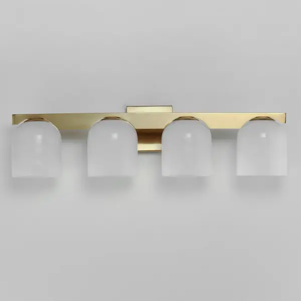 Cut-out metalwork curves around modern bell-shaped glass shades. The series includes pendants and bath vanities available in either Clear or a swirling Marble glass. Available in various complementary finishes: Polished Chrome, Matte Black, or Natural Aged Brass these fixtures make a delightful addition to bathroom spaces, bedrooms, or over a kitchen island. Collection: Scoop Finish: Natural Aged Brass Glass: Marble Width: 29.50" Height: 8.00" Weight: 8.80 lb Extension from Wall: 7.00" Wire: 6" Canopy: 5"x5" Number of Bulbs: 4 Maximum Wattage: 6.00 W Bulb Type: E26 Bulb Base: E26 Medium Light Source: LED Dimmable Voltage: 120.00 V Material: Steel, Glass Safety Listing: cULus Safety Rating: Damp LED Spec Sheet Instructions - alternate view
