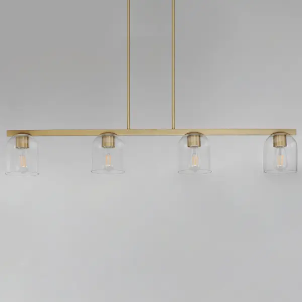 Cut-out metalwork curves around modern bell-shaped glass shades. The series includes pendants and bath vanities available in either Clear or a swirling Marble glass. Available in various complementary finishes: Polished Chrome, Matte Black, or Natural Aged Brass these fixtures make a delightful addition to bathroom spaces, bedrooms, or over a kitchen island. Collection: Scoop Finish: Natural Aged Brass Glass: Clear Width: 5.25" Height: 6.75" Length: 46.00" Weight: 9.70 lb Wire: 120" Canopy: 10.25"x4.75"x0.75" Number of Bulbs: 4 Maximum Wattage: 60.00 W Bulb Type: A19 Bulb Base: E26 Medium Light Source: Incandescent Dimmable Voltage: 120.00 V Material: Steel, Glass Safety Listing: cULus Safety Rating: Dry Manufacturer Warranty: 3 Spec Sheet Instructions - alternate view