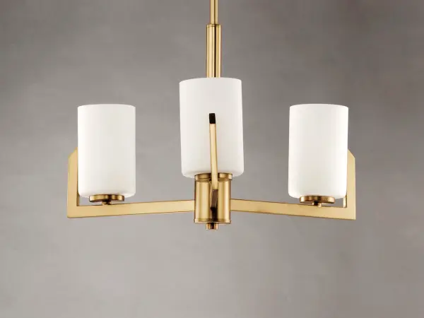 Inspired by the Modernist architect Edward Dart, this collection features straight line frames finished in Satin Brass, Satin Nickel, or Matte Black that support Satin White glass cylinders for a clean and modern look. The frames' ends turn up before the glass in sharp mitered angles emphasizing a minimalist geometry popular in Modernist work. Collection: Dart Finish: Satin Brass Glass: Satin White Width: 22.25" Height: 13.50" Length: 22.25" Weight: 5.69 lb Wire: 120" Canopy: 5"x5"x1" Number of Bulbs: 3 Maximum Wattage: 60.00 W Bulb Type: A19 Bulb Base: E26 Medium Light Source: Incandescent Voltage: 120.00 V Material: Steel, Glass Safety Listing: cETLus Safety Rating: Dry Manufacturer Warranty: 3 Spec Sheet Instructions Parts Diagram - alternate view