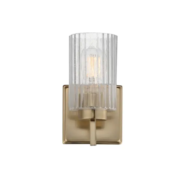 Clear Ribbed glass cylinders are supported on gracefully sweeping frames. The glass pattern helps to diffuse the light source while adding texture and style to the design. Available in Polished Nickel, Satin Champagne, or Matte Black. Collection: Rigata Finish: Satin Champagne Glass: Clear Ribbed Width: 5.00" Height: 9.00" Weight: 2.60 lb Extension from Wall: 5.75" Wire: 8" Canopy: 5"x5" Number of Bulbs: 1 Maximum Wattage: 60.00 W Bulb Type: A19 Bulb Base: E26 Medium Light Source: Incandescent Dimmable Voltage: 120.00 V Material: Steel, Glass Safety Listing: cULus Safety Rating: Damp Manufacturer Warranty: 3 Spec Sheet Instructions