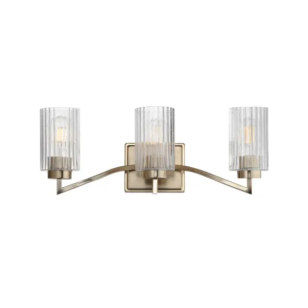 Clear Ribbed glass cylinders are supported on gracefully sweeping frames. The glass pattern helps to diffuse the light source while adding texture and style to the design. Available in Polished Nickel, Satin Champagne, or Matte Black. Collection: Rigata Finish: Satin Champagne Glass: Clear Ribbed Width: 22.75" Height: 8.50" Weight: 6.30 lb Extension from Wall: 5.75" Wire: 8" Canopy: 5"x6" Number of Bulbs: 3 Maximum Wattage: 60.00 W Bulb Type: A19 Bulb Base: E26 Medium Light Source: Incandescent Dimmable Voltage: 120.00 V Material: Steel, Glass Safety Listing: cULus Safety Rating: Damp Manufacturer Warranty: 3 Spec Sheet Instructions