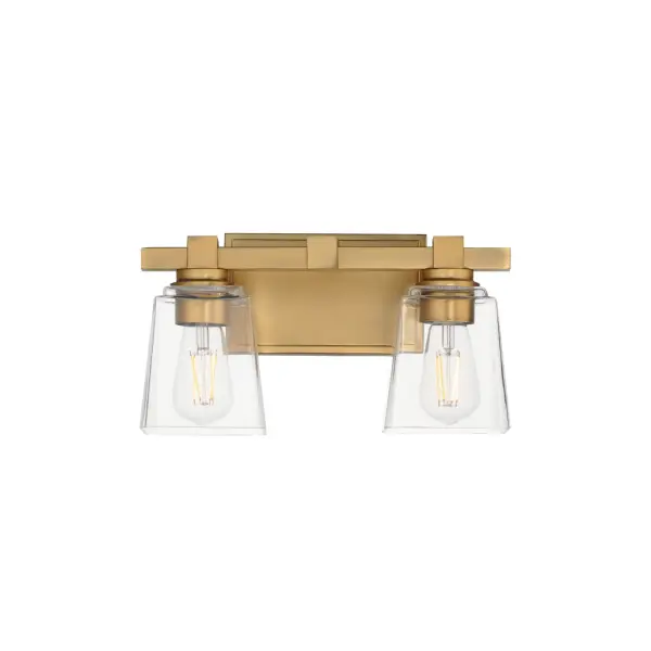 A composition of square forms that feature a Clear tapered square glass shade, these bath vanities provide a transitional design that suits both modern and traditional spaces. Available in Matte Black, Polished Chrome, Satin Nickel, and Natural Aged Brass. Collection: Cubos Finish: Natural Aged Brass Glass: Clear Width: 14.00" Height: 8.00" Weight: 4.10 lb Extension from Wall: 6.00" Wire: 8" Canopy: 4.75"x7.75" Number of Bulbs: 2 Maximum Wattage: 60.00 W Bulb Type: A19 Bulb Base: E26 Medium Light Source: Incandescent Dimmable Voltage: 120.00 V Material: Steel, Glass Safety Listing: cULus Safety Rating: Damp Manufacturer Warranty: 3 Spec Sheet Instructions