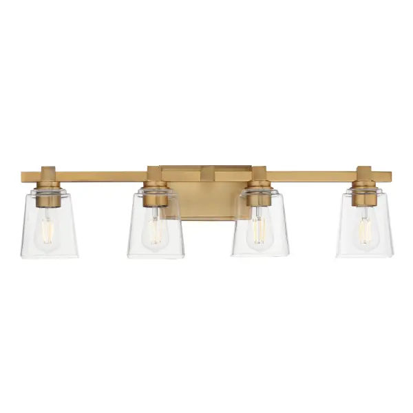 A composition of square forms that feature a Clear tapered square glass shade, these bath vanities provide a transitional design that suits both modern and traditional spaces. Available in Matte Black, Polished Chrome, Satin Nickel, and Natural Aged Brass. Collection: Cubos Finish: Natural Aged Brass Glass: Clear Width: 30.75" Height: 8.00" Weight: 8.60 lb Extension from Wall: 6.00" Wire: 8" Canopy: 4.75"x7.75" Number of Bulbs: 4 Maximum Wattage: 60.00 W Bulb Type: A19 Bulb Base: E26 Medium Light Source: Incandescent Dimmable Voltage: 120.00 V Material: Steel, Glass Safety Listing: cULus Safety Rating: Damp Manufacturer Warranty: 3 Spec Sheet Instructions