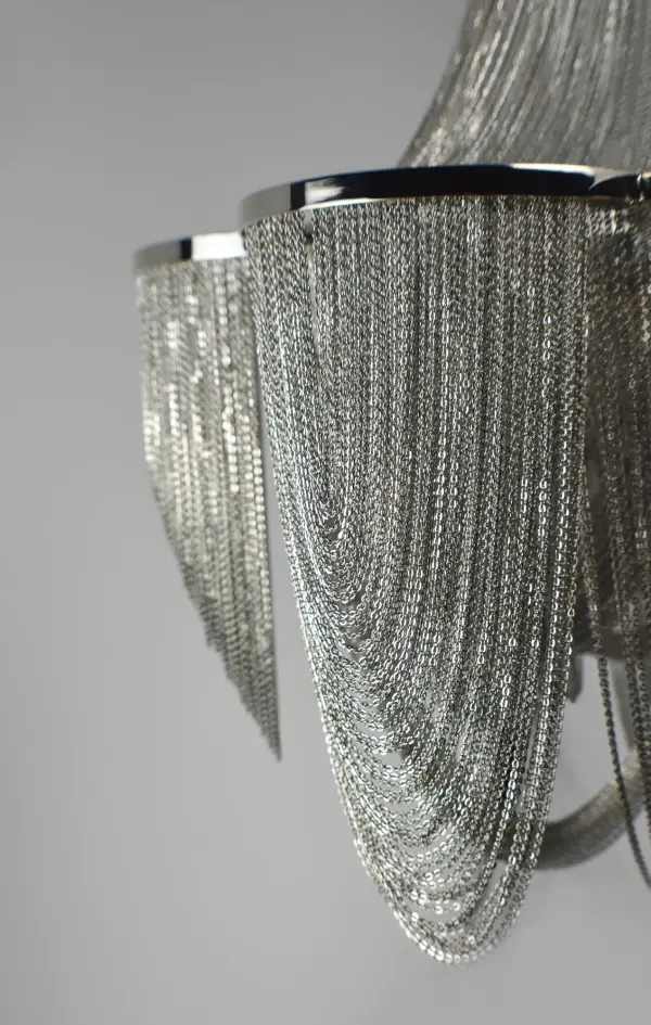 Chantilly collection features metal frames gracefully draped with Nickel finished jewelry chain. Metal trim rings of Polished Nickel add sharp contrast to the softness of the chain, which conceals the xenon light source. - alternate view