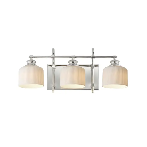 Ribbed ceramic shades are gracefully suspended on classic arching tube frames, creating a timeless yet modern design. The matte bisque-fired ceramic is translucent softly diffuses light while highlighting the ribbed raised pattern. Available in elegant finishes, choose from Natural Aged Brass, Oil Rubbed Bronze, or Polished Nickel frames to complement your space. Collection: Bisque Finish: Polished Nickel Glass: White Width: 24.00" Height: 10.00" Weight: 6.38 lb Extension from Wall: 9.00" Wire: 8" Canopy: 6"x12" Number of Bulbs: 3 Maximum Wattage: 60.00 W Bulb Base: E26 Medium Light Source: Incandescent Dimmable Voltage: 120.00 V Material: Steel, Glass Safety Listing: cETLus Safety Rating: Damp Spec Sheet Instructions
