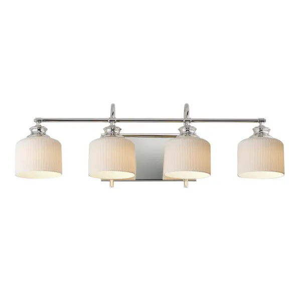 Ribbed ceramic shades are gracefully suspended on classic arching tube frames, creating a timeless yet modern design. The matte bisque-fired ceramic is translucent softly diffuses light while highlighting the ribbed raised pattern. Available in elegant finishes, choose from Natural Aged Brass, Oil Rubbed Bronze, or Polished Nickel frames to complement your space. Collection: Bisque Finish: Polished Nickel Glass: White Width: 32.00" Height: 10.00" Weight: 7.48 lb Extension from Wall: 9.00" Wire: 8" Canopy: 6"x12" Number of Bulbs: 4 Maximum Wattage: 60.00 W Bulb Base: E26 Medium Light Source: Incandescent Dimmable Voltage: 120.00 V Material: Steel, Glass Safety Listing: cETLus Safety Rating: Damp Spec Sheet Instructions