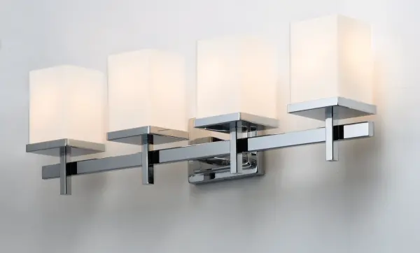 Square glass shades ride upon a rectangular bar to create geometry at its best. Available in Polished Chrome with Satin White glass and Satin Nickel and white Linen glass. Collection: Tetra Finish: Polished Chrome Glass: Satin White Width: 30.00" Height: 9.00" Weight: 6.82 lb Extension from Wall: 6.00" Canopy: 4.75"x6.5" Number of Bulbs: 4 Maximum Wattage: 60.00 W Bulb Type: A19 Bulb Base: E26 Medium Light Source: Incandescent Dimmable Voltage: 120.00 V Material: Steel, Glass Safety Listing: cETLus Safety Rating: Damp Manufacturer Warranty: 1 Spec Sheet Instructions Parts Diagram - alternate view