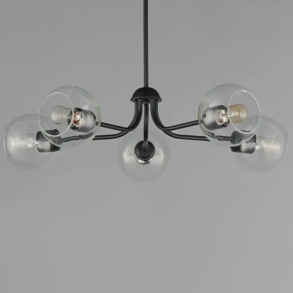 Clear glass globes on a Natural Aged Brass frame create a transitional design that is sure to please. The sloping arms level out to create a simple Mid Century Modern configuration. A full range of the products in this collection include chandeliers, pendants, flush mounts, and sconces. - alternate view