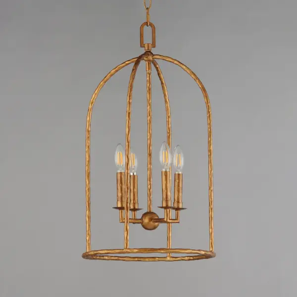 Rooted in traditional European ironwork but reimagined for modern spaces, the Martel collection elevates the classic lantern with hand-forged artistry and stripped-down elegance. A sculptural hammered iron frame arcs gracefully to define the open silhouette, while simple candelabra sockets and 90-degree hammered candle sleeves emphasize light, shadow, and raw materiality. With no glass or shades, the clean construction highlights the organic hand-hammered texture and allows the glow of candlelight to radiate freely. Available in a warm Etruscan Gold or moody Blacksmith finish, Martel brings a refined yet rustic sensibility to entryways, kitchens, or living spaces. Collection: Martel Finish: Etruscan Gold Width: 14.00" Height: 25.00" Length: 14.00" Weight: 6.85 lb Chain: 36" Wire: 120" Canopy: 5"x5"x0.75" Number of Bulbs: 4 Maximum Wattage: 60.00 W Bulb Type: Candelabra Bulb Base: E12 Candelabra Light Source: Incandescent Voltage: 120.00 V Material: Steel Safety Listing: cETLus Safety Rating: Dry Manufacturer Warranty: 3 Spec Sheet Instructions - alternate view