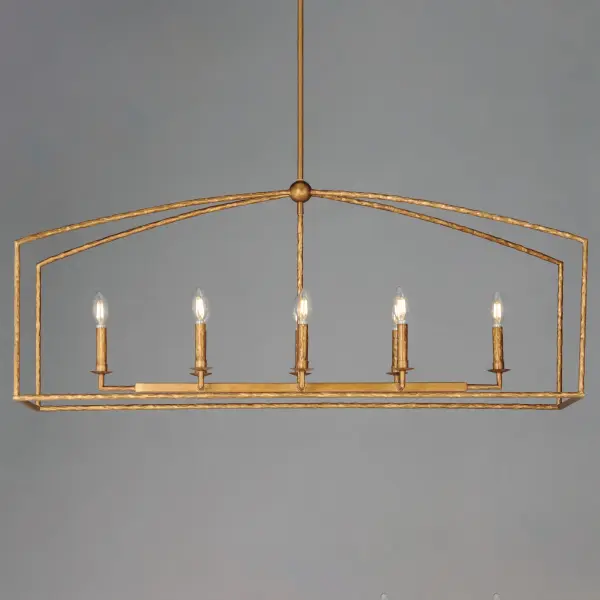 Rooted in traditional European ironwork but reimagined for modern spaces, the Martel collection elevates the classic lantern with hand-forged artistry and stripped-down elegance. A sculptural hammered iron frame arcs gracefully to define the open silhouette, while simple candelabra sockets and 90-degree hammered candle sleeves emphasize light, shadow, and raw materiality. With no glass or shades, the clean construction highlights the organic hand-hammered texture and allows the glow of candlelight to radiate freely. Available in a warm Etruscan Gold or moody Blacksmith finish, Martel brings a refined yet rustic sensibility to entryways, kitchens, or living spaces. Collection: Martel Finish: Etruscan Gold Width: 14.50" Height: 19.00" Length: 46.00" Weight: 14.80 lb Wire: 120" Canopy: 5"x5"x0.75" Number of Bulbs: 8 Maximum Wattage: 60.00 W Bulb Type: Candelabra Bulb Base: E12 Candelabra Light Source: Incandescent Voltage: 120.00 V Material: Steel Safety Listing: cETLus Safety Rating: Dry Manufacturer Warranty: 3 Spec Sheet Instructions - alternate view