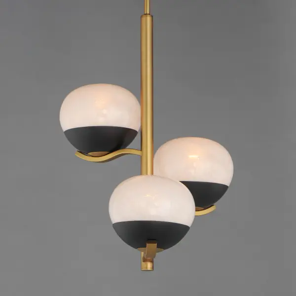 Notably stylish and unique, the Lucerne collection features oblong glossy glass globes with a swirling Marble pattern that exudes sophistication. The distinctive rectangular arms gracefully curve downward, seamlessly blending robust metal fabrication with precision and fluid elegance. Contrasting Black and Natural Aged Brass finishes accentuate the bobeches, adding depth and visual intrigue. Offering versatile installation options, the chandelier can be suspended by a sleek stem or the chain included for various height adjustment. - alternate view