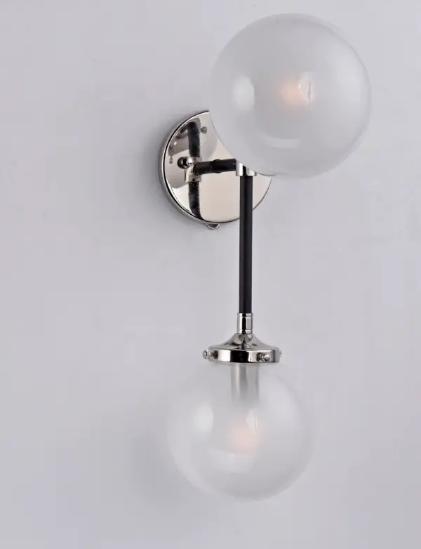 A Mid-Century Modern industrial classic revived featuring softly bent arms finished in Black with Polished Nickel accents that terminate at round White opal glass balls. - alternate view