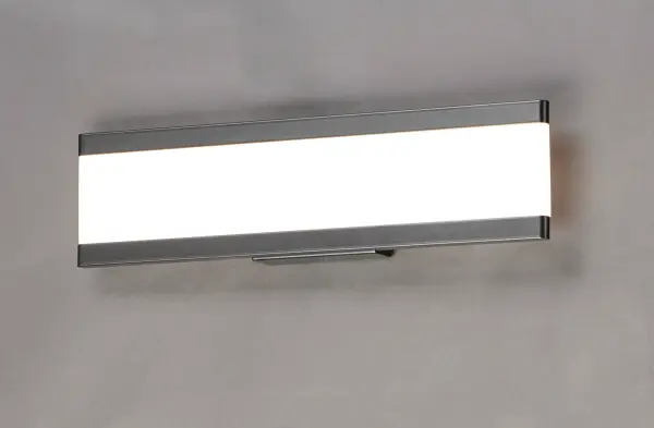 Dual Black aluminum channels support a Frost acrylic diffuser that projects light into the room when illuminated. Available in 4 lengths, this collection can be installed horizontal above the mirror or vertical on each side. - alternate view