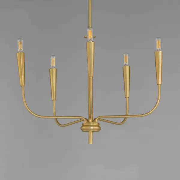 A simple candle style chandelier is given a modern edge with tall tapered candle covers that sit at the ends of curved arms without a bobeche beneath them. Available in Satin Brass or Matte Black, the collection compliments many architectural interiors and allows for creative styling through the selection of lamp type. Pair with our T6 lamp for more modern, industrial flair or classic candelabra for a clean, transitional look. This series provides a convenient new take on the candle chandelier with subtle and unique design details. Collection: Vela Finish: Satin Brass Width: 24.00" Height: 18.25" Length: 24.00" Weight: 4.02 lb Wire: 120" Canopy: 4.75"x4.75"x0.75" Number of Bulbs: 5 Maximum Wattage: 60.00 W Bulb Type: B10 - T6 - G16.5 Bulb Base: E12 Candelabra Light Source: Incandescent Voltage: 120.00 V Material: Steel Safety Rating: Dry Spec Sheet Instructions - alternate view