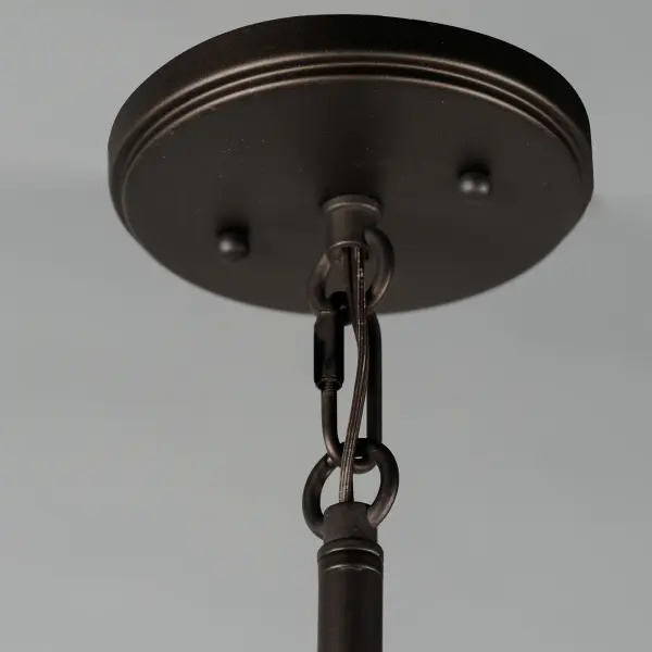 Elevate the industrial with meticulously crafted metal spun shades in Oil Rubbed Bronze with Antique Brass rivet details on matte black straps and brass hook suspension system. Light emits from both the top and bottom of the pendants as well as reveals spaced along the band on the flush mount. The large 3-Light pendant includes a frosted glass diffuser that conceals the light cluster within and evenly diffuses the light below. - alternate view